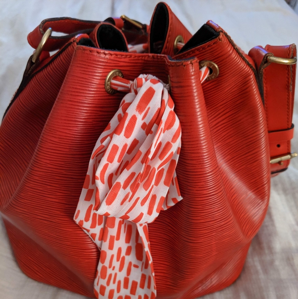 Louis Vuitton red leather Petit Noe